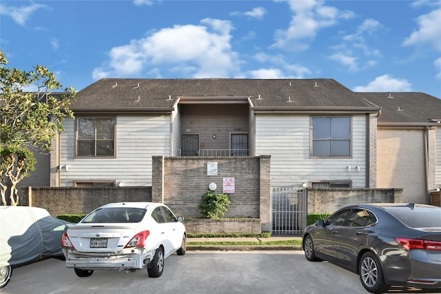 8385 Sands Point Dr Unit 5, Houston, TX 77036 - view of front facade with uncovered parking