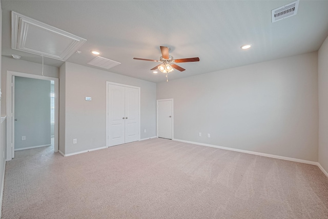 31630 Heguy Pass, Fulshear, TX 77441 - unfurnished bedroom featuring attic access, recessed lighting, baseboards, light colored carpet, and ceiling fan