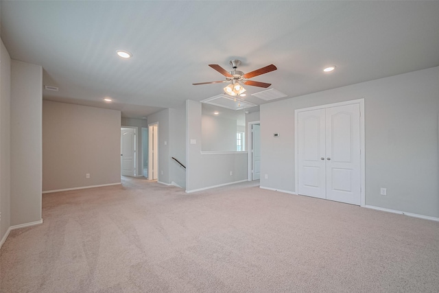 31630 Heguy Pass, Fulshear, TX 77441 - empty room with a ceiling fan, light carpet, baseboards, recessed lighting, and attic access