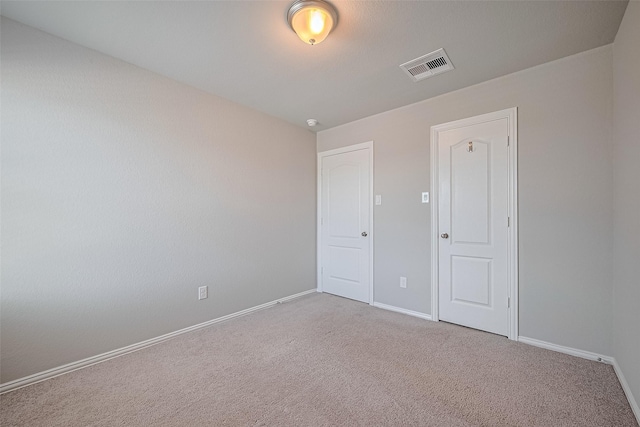 31630 Heguy Pass, Fulshear, TX 77441 - unfurnished bedroom featuring carpet flooring and baseboards