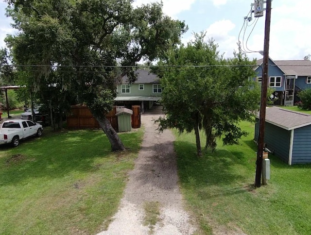 6840 County Road 659, Brazoria, TX 77422 - obstructed view of property featuring a front lawn