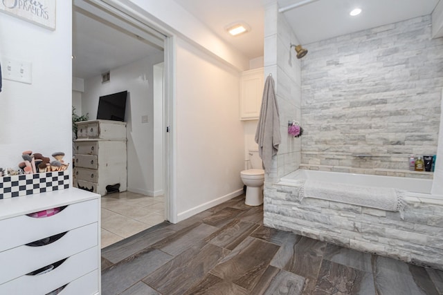 6840 County Road 659, Brazoria, TX 77422 - bathroom featuring bathtub / shower combination, toilet, vanity, recessed lighting, and baseboards