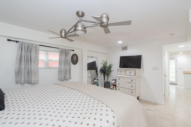 6840 County Road 659, Brazoria, TX 77422 - bedroom with light tile patterned flooring, recessed lighting, and a ceiling fan