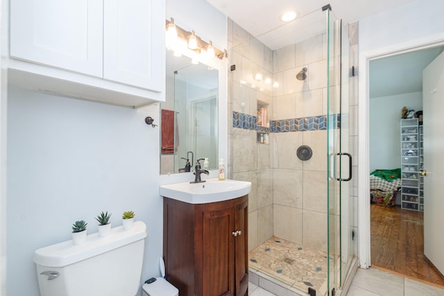 6840 County Road 659, Brazoria, TX 77422 - bathroom with toilet, vanity, a shower stall, recessed lighting, and tile patterned flooring