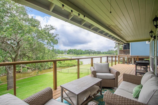 6840 County Road 659, Brazoria, TX 77422 - wooden terrace with an outdoor living space