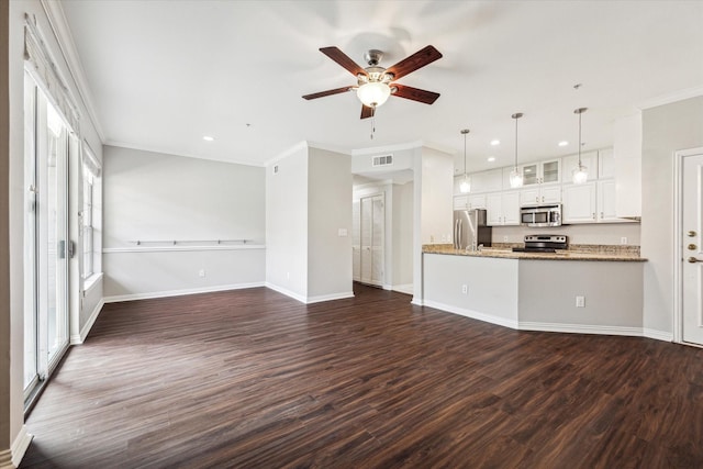2111 Welch St Unit A123, Houston, TX 77019 - unfurnished living room featuring dark wood finished floors, a ceiling fan, baseboards, recessed lighting, and ornamental molding
