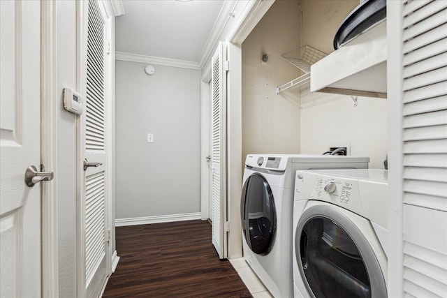 2111 Welch St Unit A123, Houston, TX 77019 - laundry area with washing machine and dryer, crown molding, wood finished floors, and baseboards