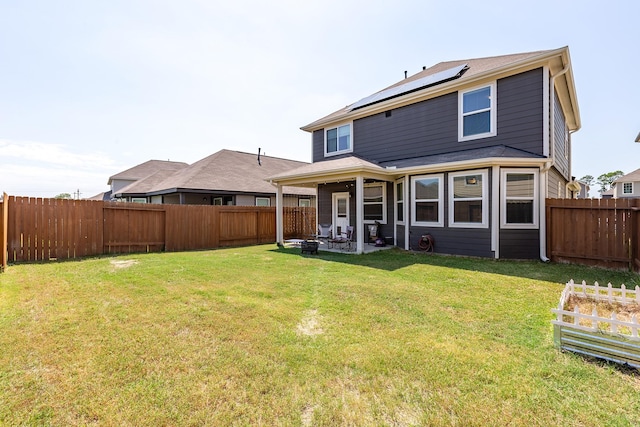 25131 Bells Canyon Dr, Porter, TX 77365 - rear view of property featuring solar panels and a patio area