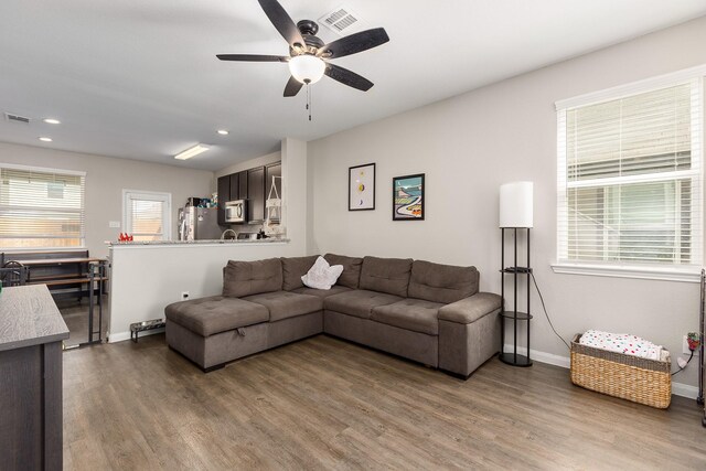 25131 Bells Canyon Dr, Porter, TX 77365 - living area with ceiling fan, light wood-style flooring, baseboards, and recessed lighting