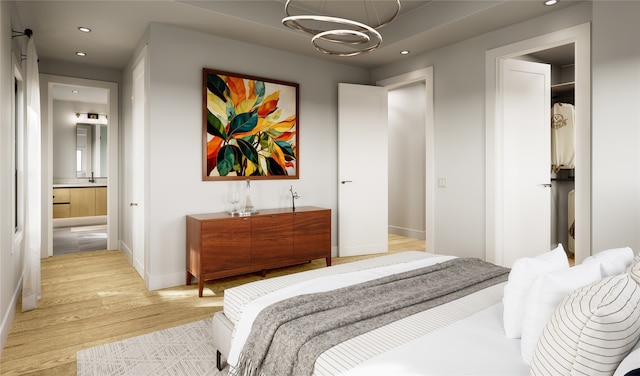 2596 W Tidwell Rd, Houston, TX 77091 - bedroom featuring light wood finished floors, recessed lighting, a chandelier, and connected bathroom
