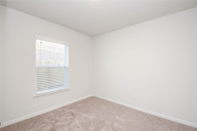 10699 Lost Maples Dr, Cleveland, TX 77328 - unfurnished room with carpet and baseboards