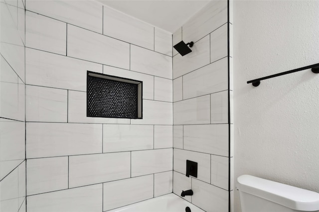 5847 Southington St, Houston, TX 77033 - full bathroom featuring bathtub / shower combination and a textured wall