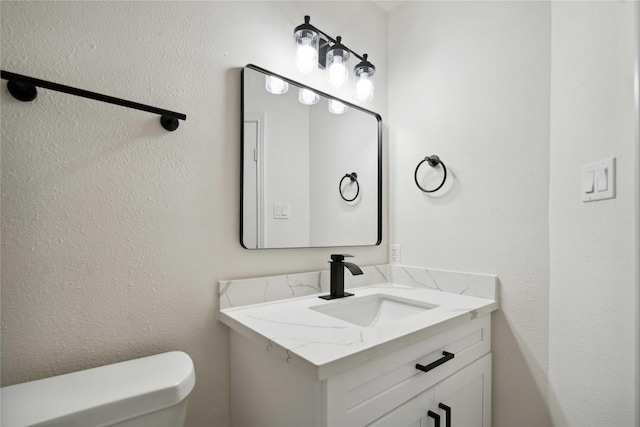 5847 Southington St, Houston, TX 77033 - bathroom featuring toilet and vanity