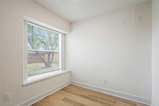 5847 Southington St, Houston, TX 77033 - empty room featuring baseboards and light wood-style flooring