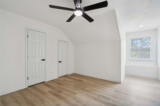 5847 Southington St, Houston, TX 77033 - additional living space with light wood-style flooring, vaulted ceiling, and ceiling fan