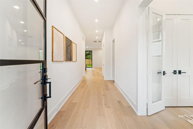 1741 Chippendale Rd, Houston, TX 77018 - hall with light wood-style flooring and recessed lighting