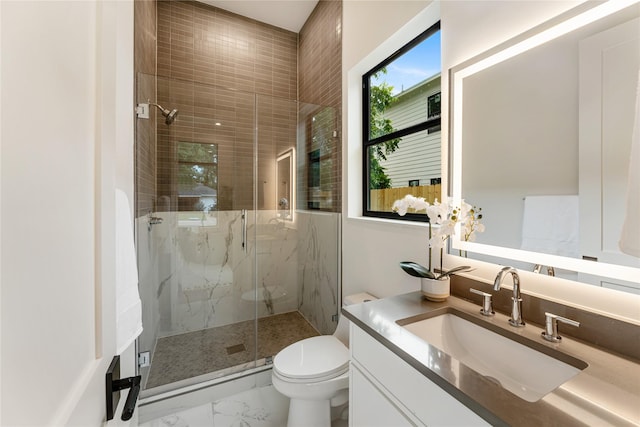1741 Chippendale Rd, Houston, TX 77018 - bathroom featuring a marble finish shower, marble look tile flooring, and vanity