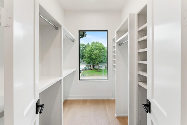 1741 Chippendale Rd, Houston, TX 77018 - walk in closet featuring light wood-type flooring