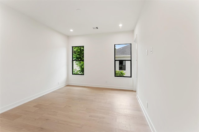 1741 Chippendale Rd, Houston, TX 77018 - empty room featuring light wood finished floors and recessed lighting