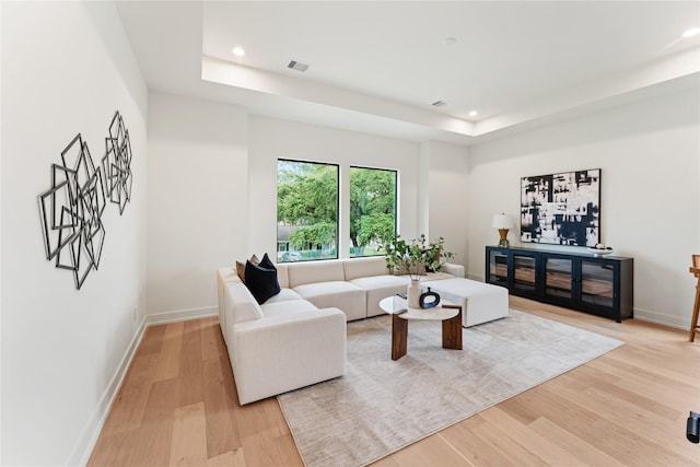 1741 Chippendale Rd, Houston, TX 77018 - living area with light wood-type flooring, recessed lighting, and a tray ceiling
