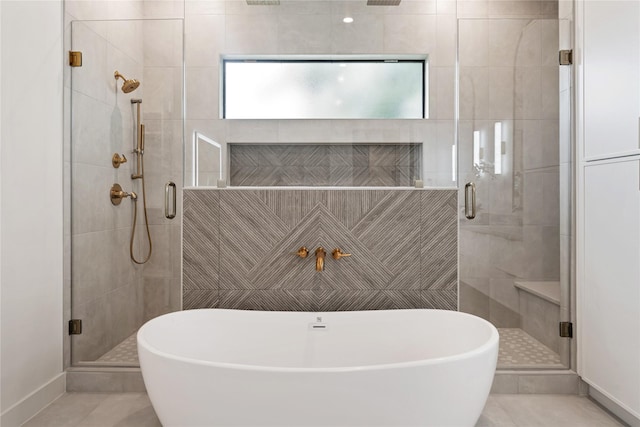 1741 Chippendale Rd, Houston, TX 77018 - full bathroom with a stall shower, a soaking tub, and tile patterned floors