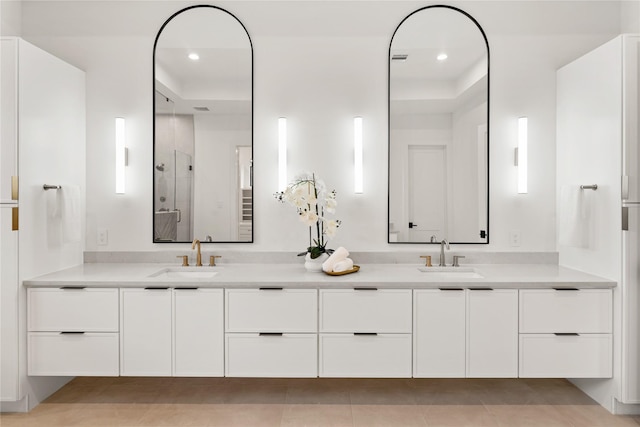1741 Chippendale Rd, Houston, TX 77018 - bathroom featuring double vanity, a shower stall, and recessed lighting