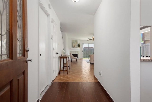 8702 Cold Lake Dr, Houston, TX 77088 - hall with dark tile patterned flooring and baseboards