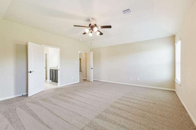 22303 Bauer Garden Dr, Hockley, TX 77447 - unfurnished bedroom with light carpet, baseboards, and ensuite bathroom