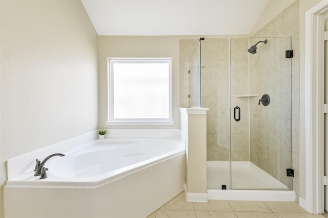 22303 Bauer Garden Dr, Hockley, TX 77447 - bathroom with a garden tub, a stall shower, tile patterned floors, and lofted ceiling