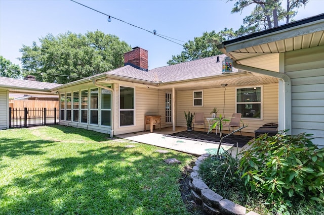 915 Timber Cove Dr, Seabrook, TX 77586 - rear view of house featuring a chimney, a patio, and a shingled roof
