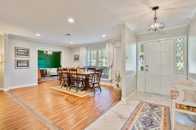 915 Timber Cove Dr, Seabrook, TX 77586 - entryway featuring crown molding, a chandelier, baseboards, recessed lighting, and light marble finish floors