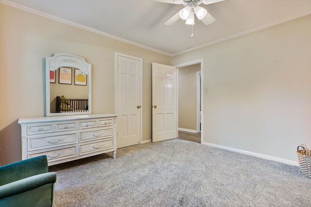 915 Timber Cove Dr, Seabrook, TX 77586 - carpeted bedroom with crown molding, baseboards, and ceiling fan