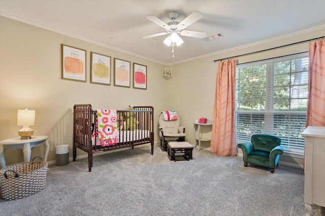 915 Timber Cove Dr, Seabrook, TX 77586 - carpeted bedroom with crown molding, a crib, and ceiling fan