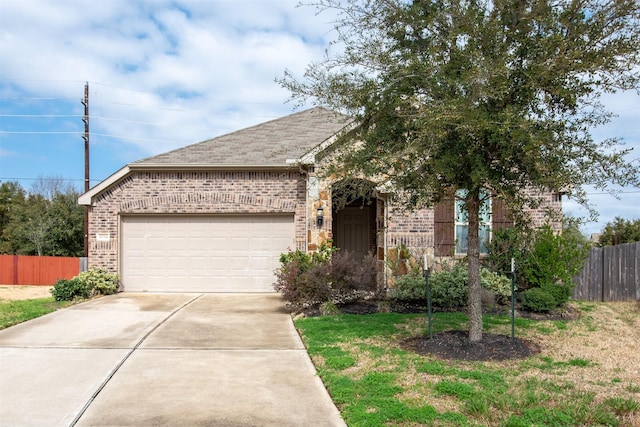6734 Camden Valley Ct, Houston, TX 77084 - view of front of property with brick siding, a garage, concrete driveway, and a shingled roof