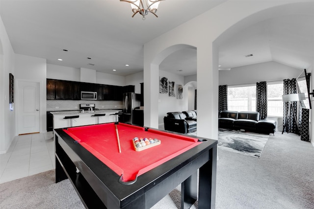 6734 Camden Valley Ct, Houston, TX 77084 - rec room featuring light colored carpet, arched walkways, pool table, recessed lighting, and light tile patterned floors