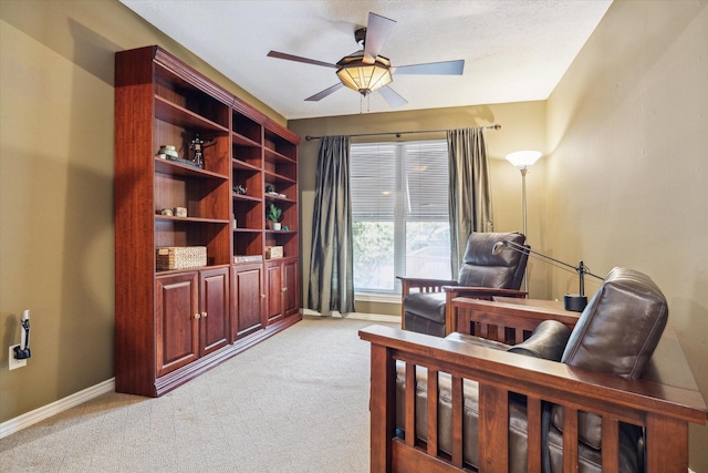 1112 Jackson Blvd, Houston, TX 77006 - bedroom featuring light carpet, baseboards, an office area, and ceiling fan