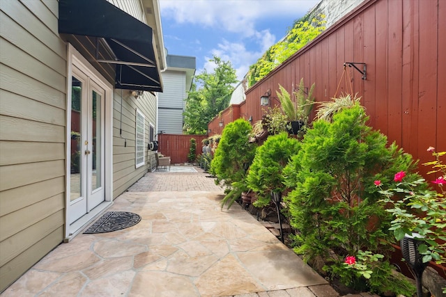 1112 Jackson Blvd, Houston, TX 77006 - fenced backyard featuring a patio area and french doors