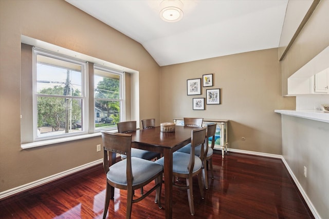 1112 Jackson Blvd, Houston, TX 77006 - dining room featuring vaulted ceiling, wood finished floors, and baseboards