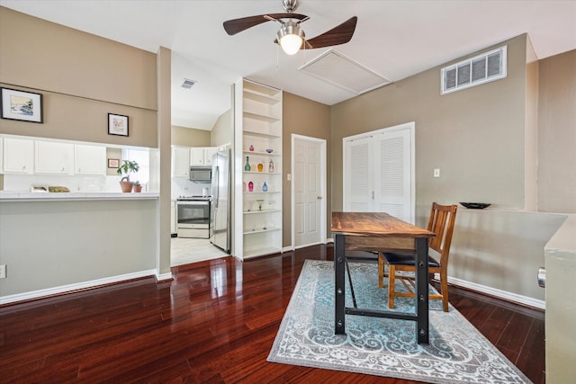 1112 Jackson Blvd, Houston, TX 77006 - dining area with ceiling fan, dark wood-style flooring, and baseboards