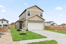 6418 Bolinas Ct, Rosharon, TX 77583 - traditional-style home featuring a garage, driveway, and a front yard