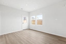 6418 Bolinas Ct, Rosharon, TX 77583 - unfurnished room featuring wood finished floors, baseboards, and recessed lighting