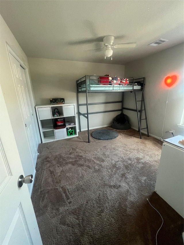 11111 Grape Hyacinth Ln, Houston, TX 77044 - bedroom with carpet, baseboards, and ceiling fan
