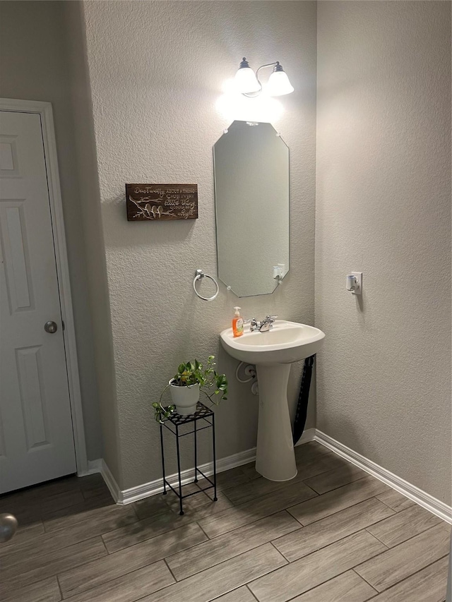 11111 Grape Hyacinth Ln, Houston, TX 77044 - bathroom with wood finish floors and baseboards