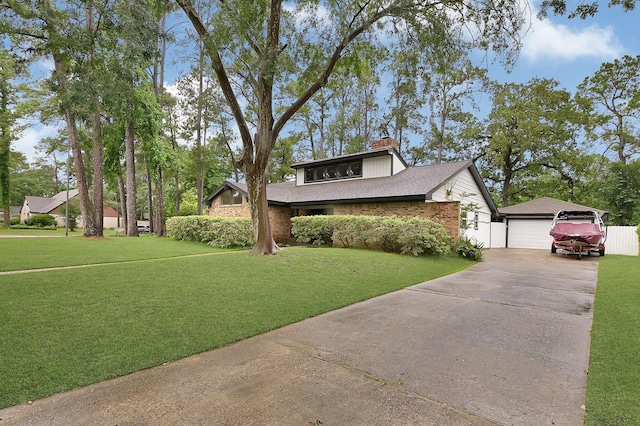 2003 Hidden Creek Dr, Houston, TX 77339 - mid-century inspired home featuring a front lawn, an outbuilding, and a chimney