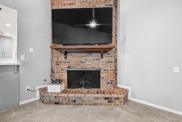 2003 Hidden Creek Dr, Houston, TX 77339 - detailed view of carpet, baseboards, and a fireplace