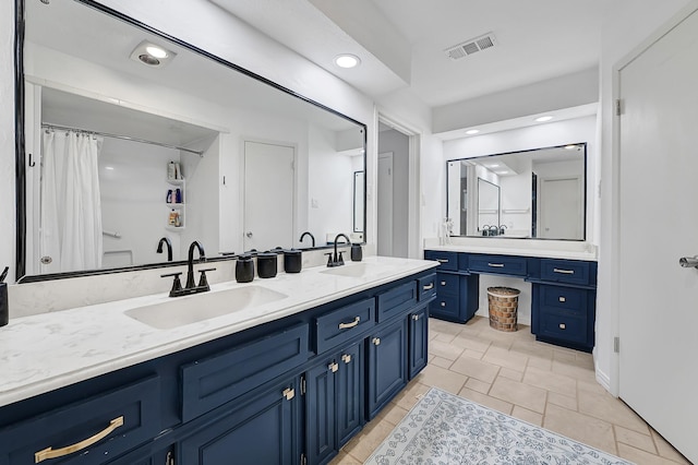 2003 Hidden Creek Dr, Houston, TX 77339 - full bathroom with double vanity and recessed lighting