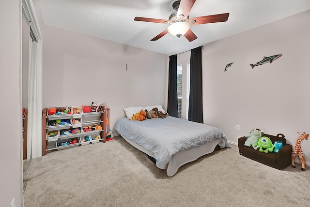 2003 Hidden Creek Dr, Houston, TX 77339 - carpeted bedroom with ceiling fan and a closet