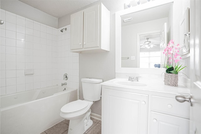12903 Belmont Legend Ct, Houston, TX 77047 - full bathroom featuring toilet, vanity, tile patterned floors, bathing tub / shower combination, and a ceiling fan