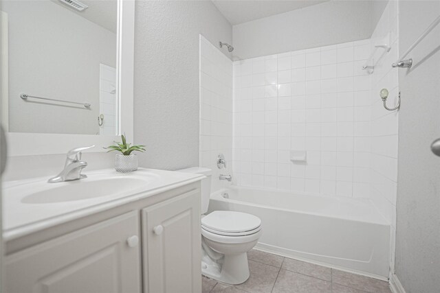12903 Belmont Legend Ct, Houston, TX 77047 - full bath featuring vanity, bathtub / shower combination, toilet, and tile patterned floors