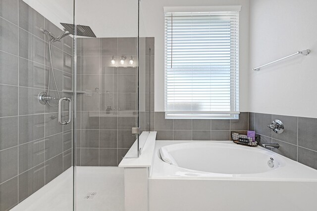 2104 Terra Rose Dr, Katy, TX 77493 - bathroom featuring a shower stall and a garden tub